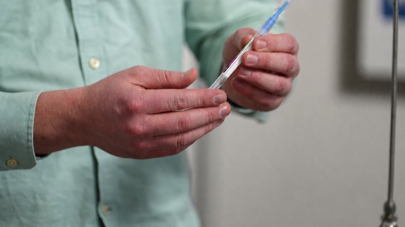An inspector preparing a targeted mold swab sample