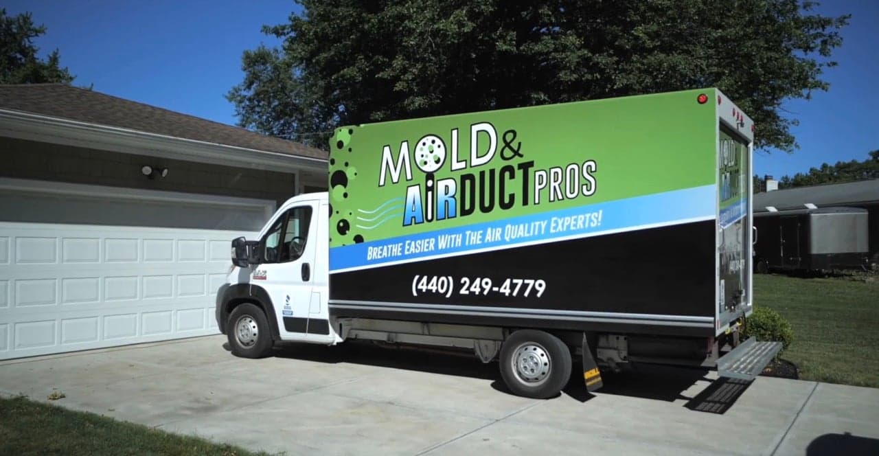 A Mold and Air Duct Pros service truck at a Northeast Ohio home