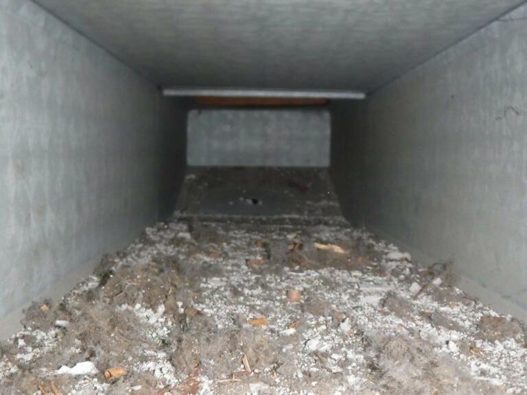 Inside view of an air duct before cleaning by air duct pros